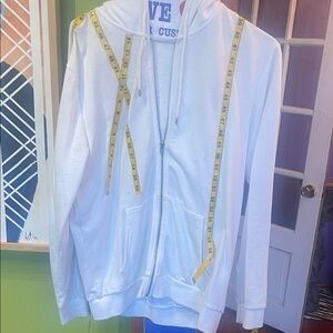 Plain White Zip-Up Hoodie
With custom measuring tape 3 d pieces attached